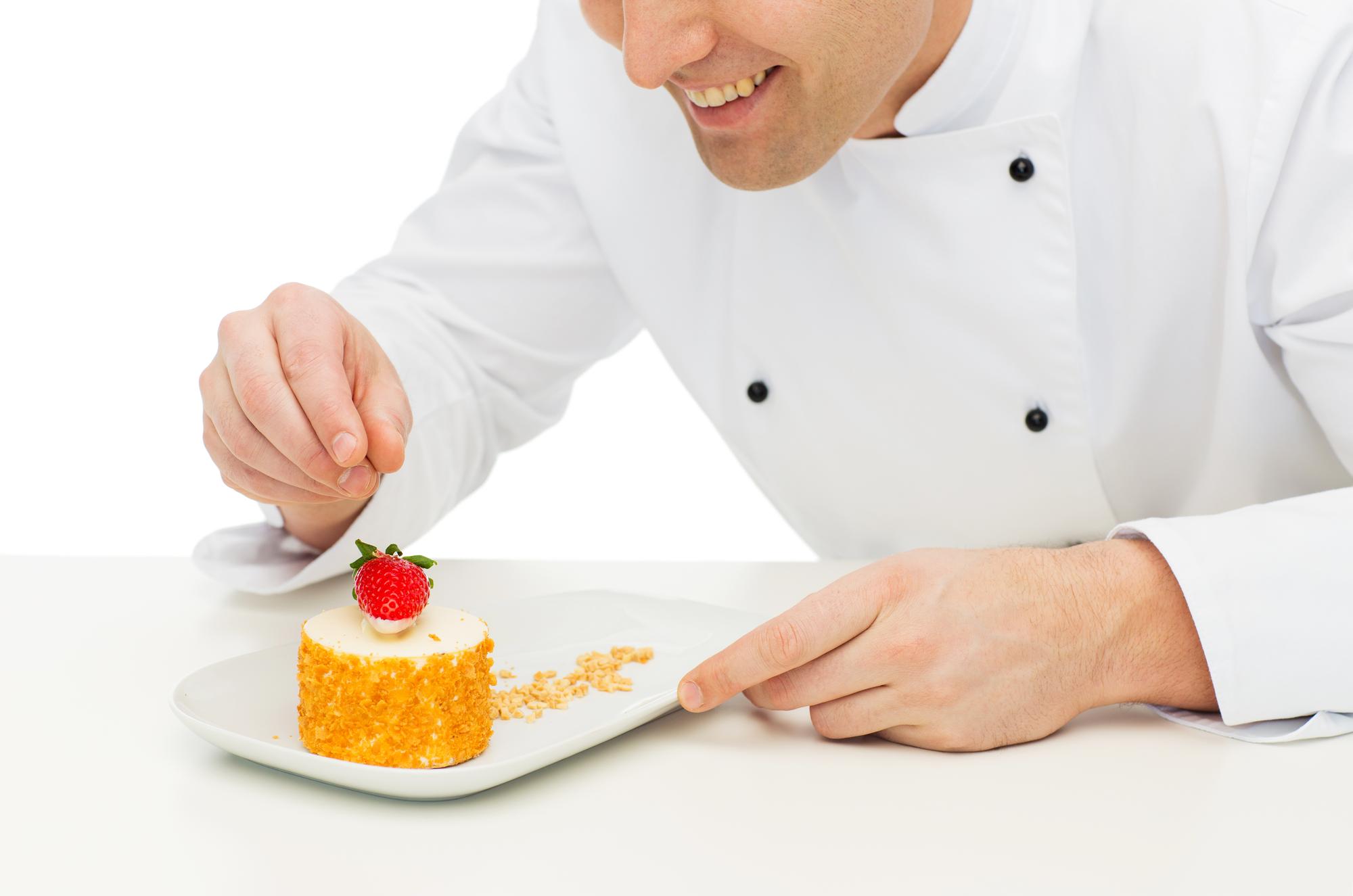 Chef arranging a dessert plate
